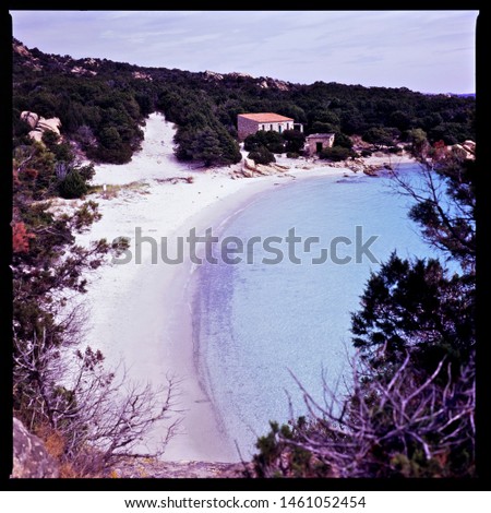 Cala Granara beach, blue sea and house in the island of Spargi. Sardinia. Italy