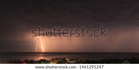 Lightning storm off the Mediterranean coast in summer