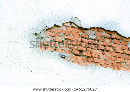 Grunge texture background of old white wall and brick