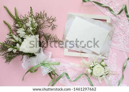 wedding card design. wedding invitation. bouquet of flowers and envelope on a pink background. congratulation