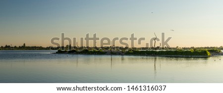 An amazing water landscape panorama picture of a bird island in Stevensweert, Limburg, The Netherlands