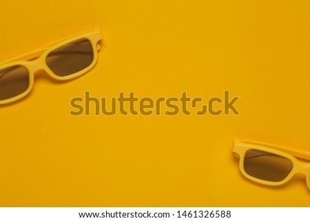 Yellow cinema glasses for 3d movie theaters