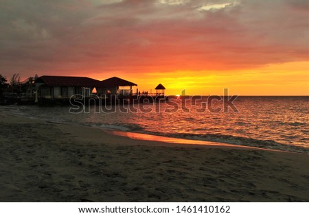 Sunset over Runaway Bay Jamaica Royalty-Free Stock Photo #1461410162