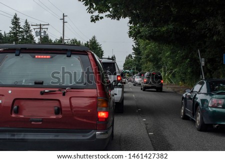A typical traffic scene in Bellingham, Washington, on a rainy day.  Taken from the passenger seat.