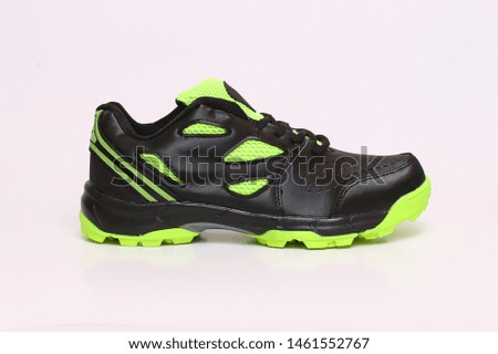 black green jogging shoes isolated on white background