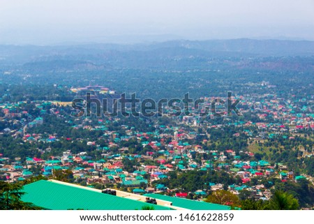 Aerial View of Dharamshala from Mcleodganj hill station, Himachal, India. Himachal Cricket ground in frame as weIl. It's culture is a beautiful blend of Tibetan with some British influence. - Image