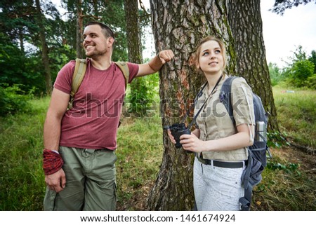 two travelers in the forest
