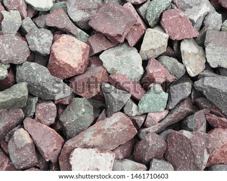 stone wall texture photo, stone background , stone floor texture, red green stone floor in the garden