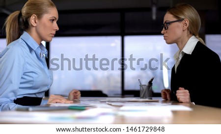 Confrontation at work, female managers competing for promotion, contest