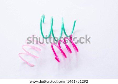 Colorful variety of plastic wire, stapler That after use and bring together