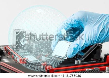 Close up shot of double exposure of someone's hand putting computer CPU into mainboard with icon about map, security and world's icon that created from hexagons and dots concept for new technology.
