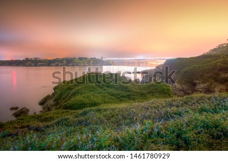 Night photo of the Ribadeo estuary, between Asturias and Galicia, the photo shows the coast and the bridge of the saints.