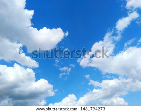 The sky is a cloud of blue and white.