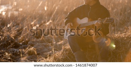 Guitar nature guy field guy plays guitar