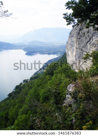 View of the lake "Le Bourget" in Savoie, France, in august 2007, with a part of a montain (rock and forest)