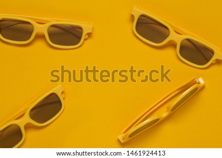 Yellow cinema goggles for 3d movie theaters