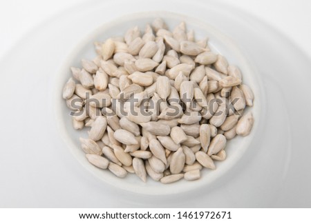 Sunflower seeds against white background