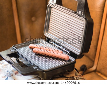 Two grilled sausages at home