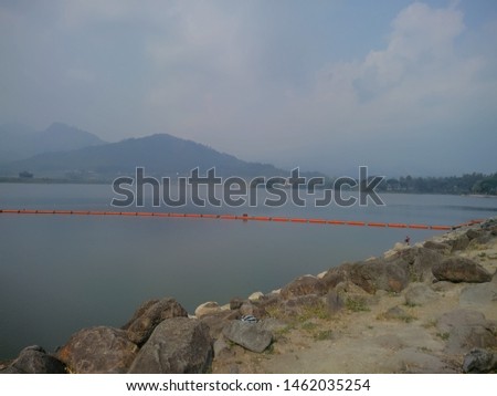metro river estuary, a collection of water between mountains