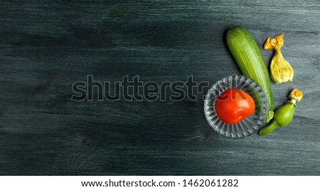 VEGETABLES ON BACKGROUND. FRESH VEGETABLES ON A WOODEN SURFACE. COPY SPACE