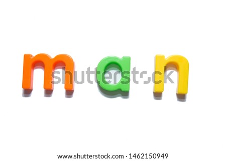 multicolored plastic letters laid out on a white background and composed into words