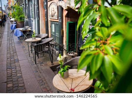 Vintage old fashioned cafe chairs with table in Copenhagen, Denmark