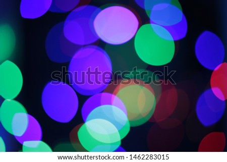 Abstract background of bright multicolor unusual bokeh saturated colors design