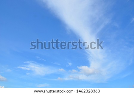 Subtle pastel background of clouds in blue sky 