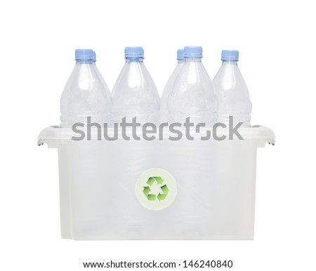 Group of plastic bottles in recycling bin over white background