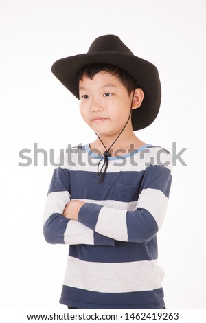 Happy Asian boy wears Cowboy hat Isolated on white background.