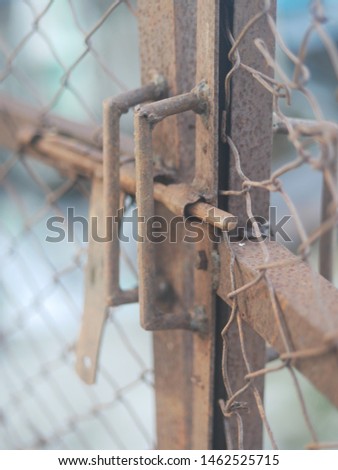 door and barbed wire fence