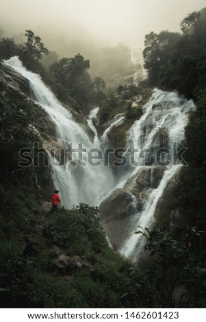 A explorer reach the hidden waterfall