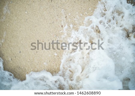 Blur wave splash on the beach background with medium shot