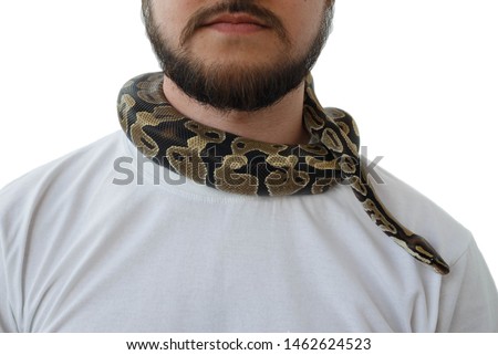 A man with a snake around his neck. White background. Snake on the neck of a man. Close-up.
