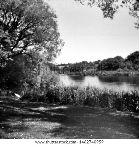 walk along the river erne, this black and white camera obscura photo is NOT sharp due to camera characteristic. Taken on analogue photographic large format negative film with a pinhole camera