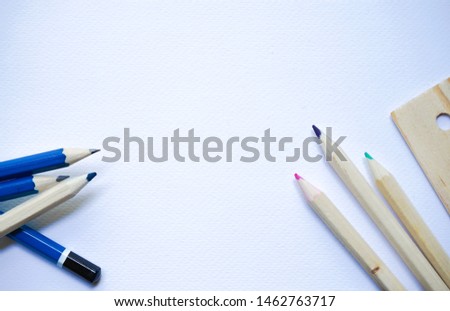 2B pencils and wooden colored pencils with ruler on white water color canvas background Royalty-Free Stock Photo #1462763717