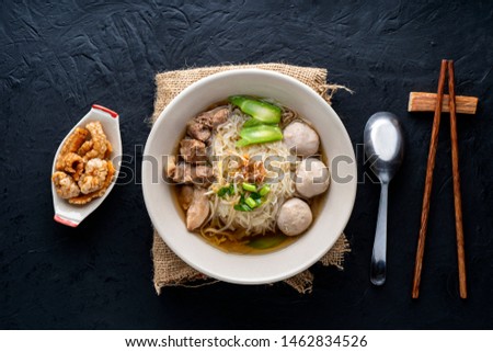 Thai style noodles on dark table background , Thai food concept Royalty-Free Stock Photo #1462834526