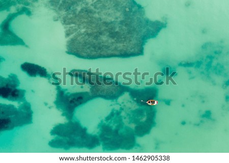 Lonely Boat over some Amazing Seabed