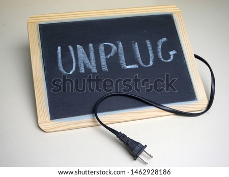 Chalkboard with power cord unplugged                               