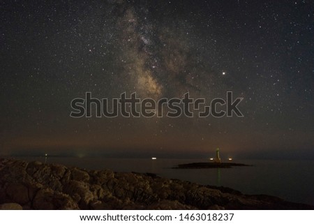 Beautiful nature and landscape photo of dark night in Razanj Croatia. Nice sky with stars at the Adriatic Sea. Calm, peaceful outdoors image.