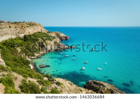 Yachts in the bay of the sea blue clean tropical coast, summer sunny day, view from above