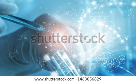 Genetic research and Biotech science Concept. Human Biology and pharmaceutical technology on laboratory background. Royalty-Free Stock Photo #1463056829