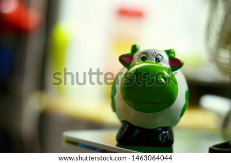 a green piggy bank photo