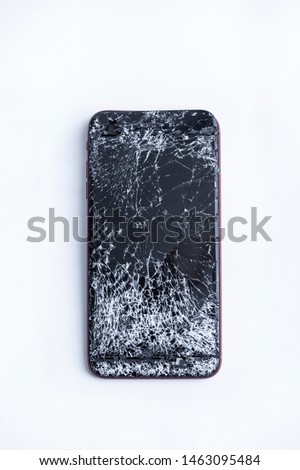 broken phone screen close-up on white background