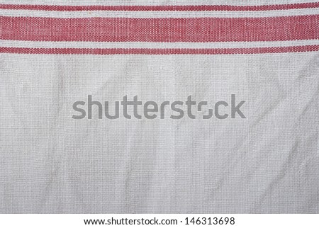 close up of white and red towel - textured background