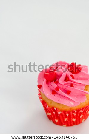 the Love cupcakes with red hearts and butter cream