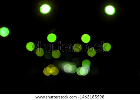 traffic light of driving car on city night street road, abstract blur bokeh background