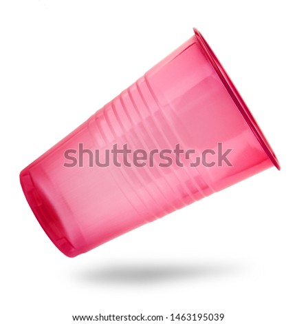 Red plastic cup isolated on a white background