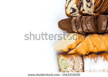 Various kinds of fresh bread, cake, homemade pastry on white isolated background. Food, vegetarian healthy food concept