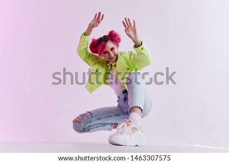 stylish young woman with pink hair